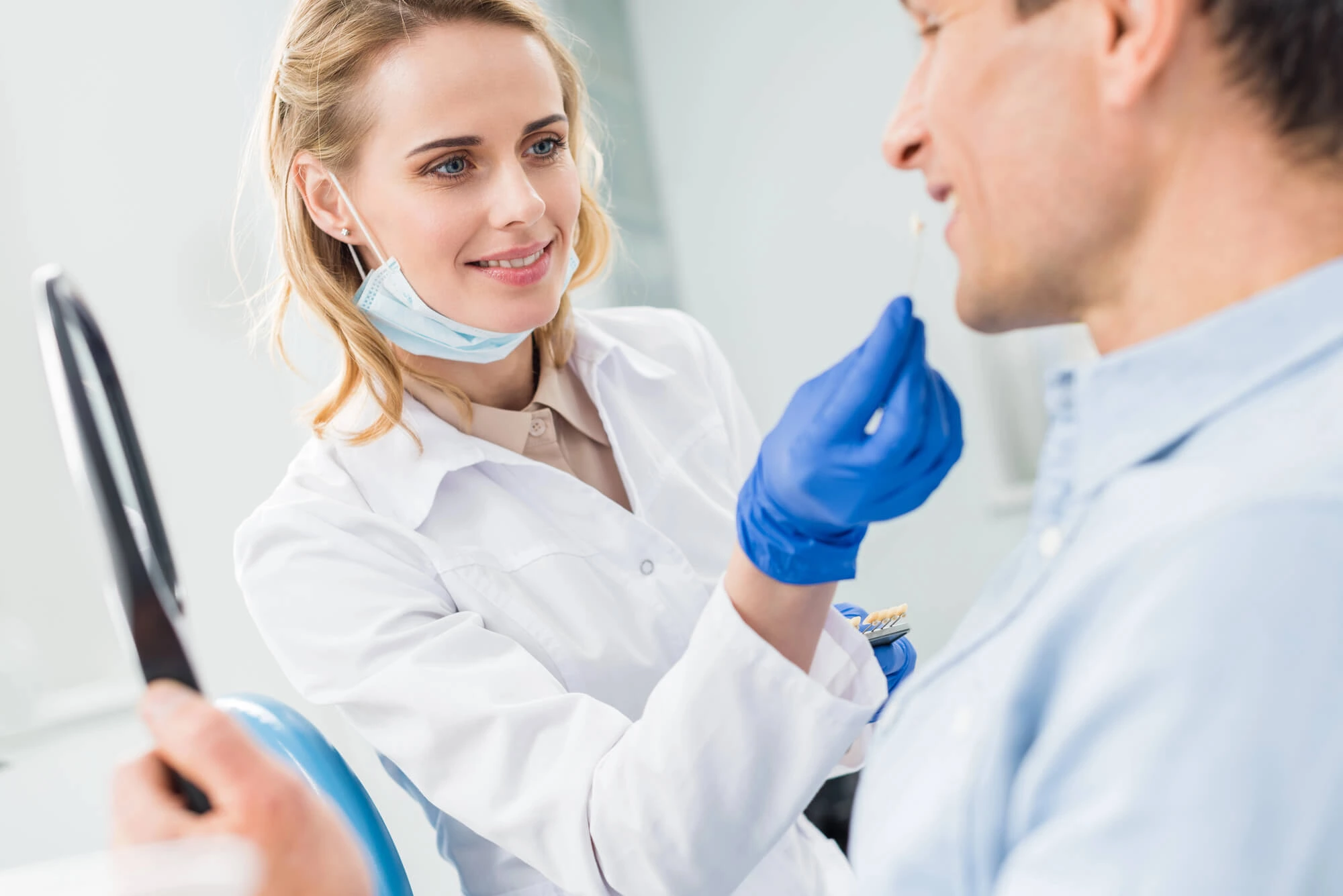 Patient Choosing Tooth Implant with Dentist in Manhattan