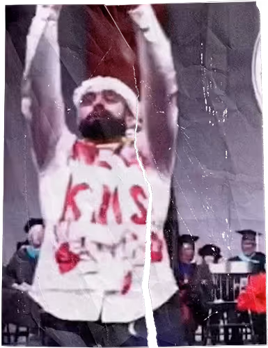 Video of a student flashing the “Red Hands” symbol during Northeastern’s graduation ceremony, evoking a painful image from the 2000 Ramallah lynching.