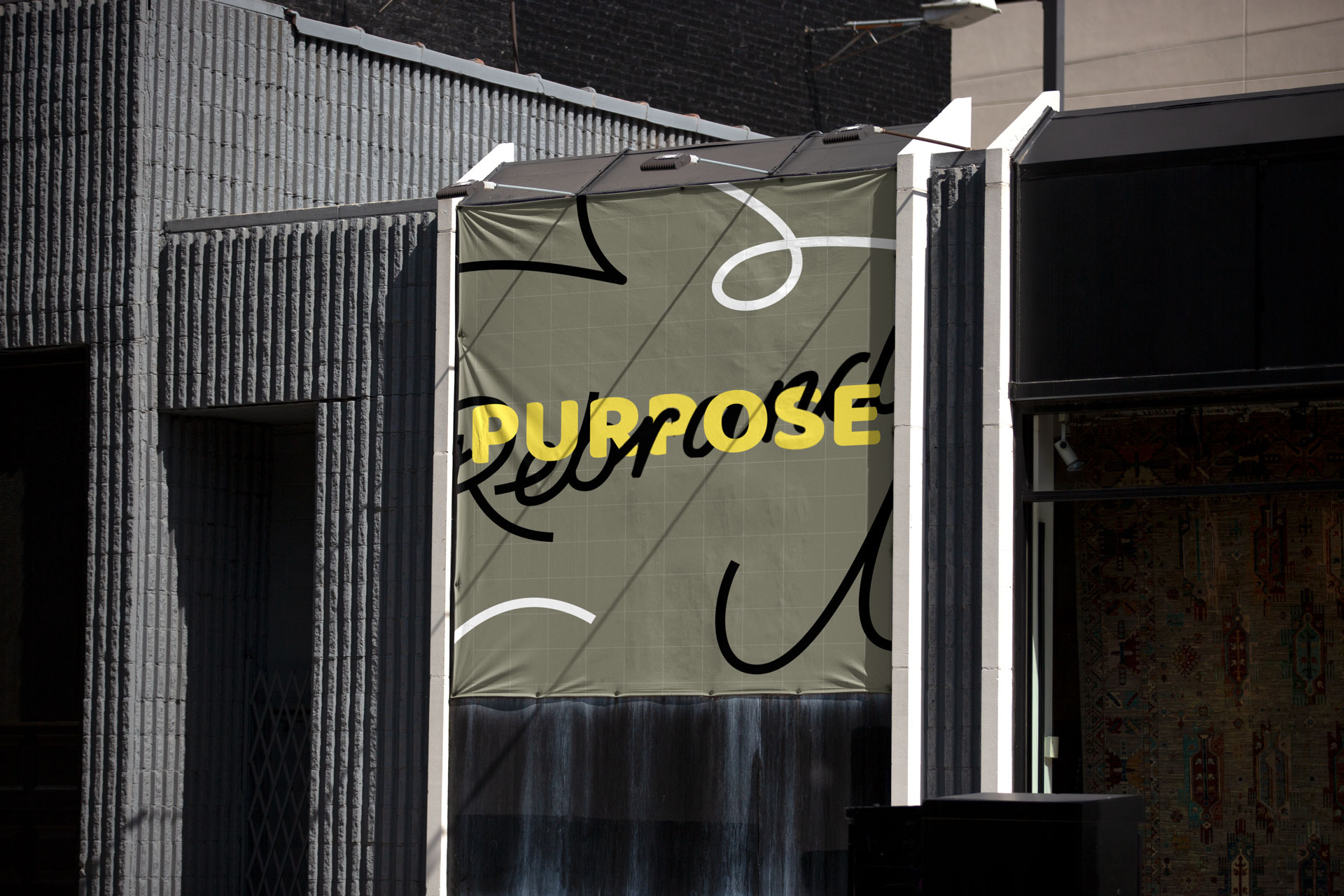 Green billboard with yellow text that says "Purpose" of a rebrand
