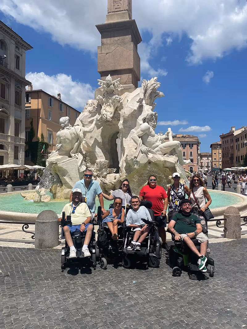 A group photo in front of a fountain in Piazza Navona