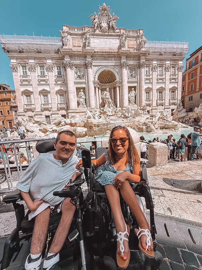 Jordan Dickey and Natalie Russo-Dickey in front of the Trevi Fountain in Italy