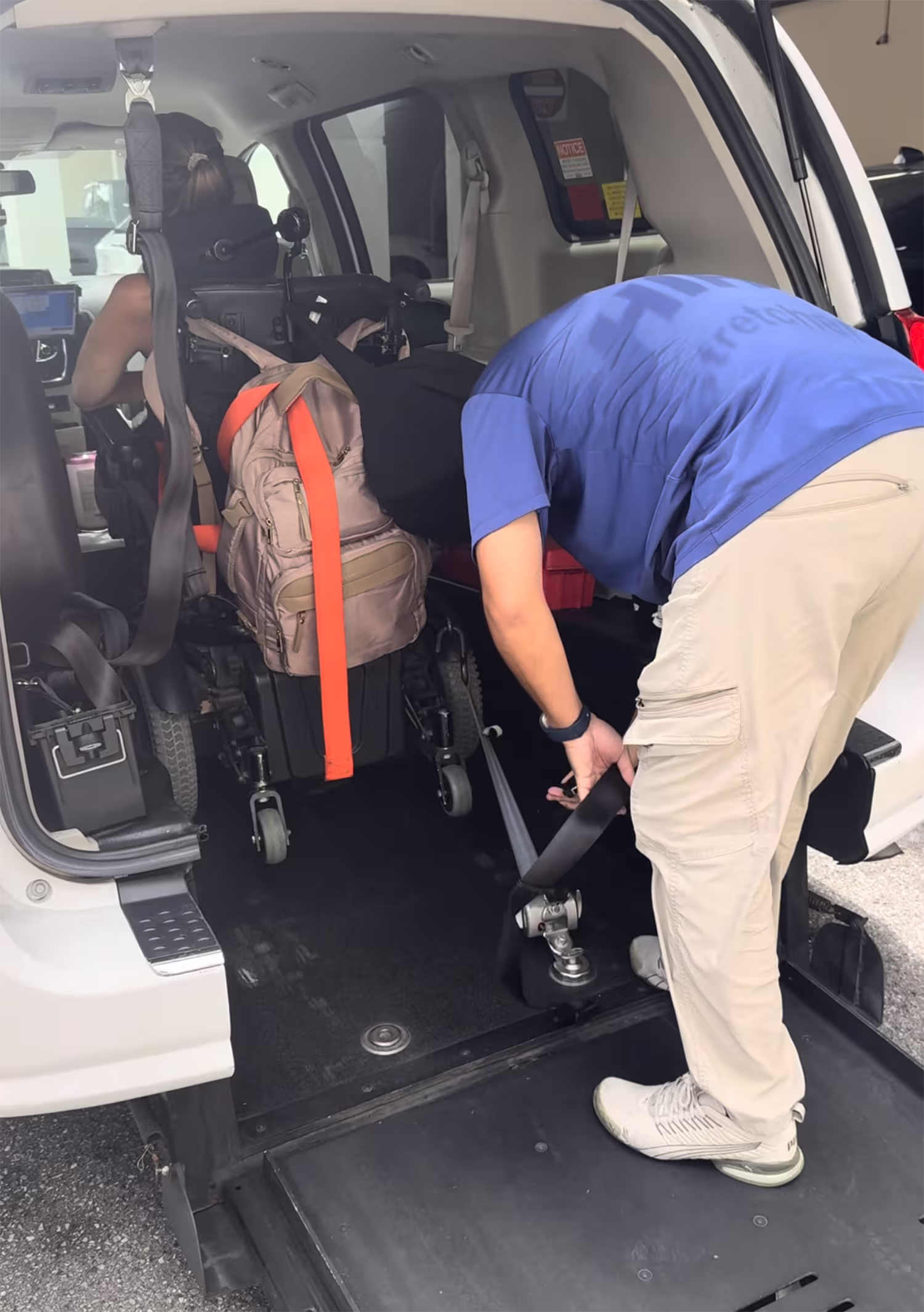 Power wheelchair secured inside an accessible wheelchair transport van in Clearwater Beach
