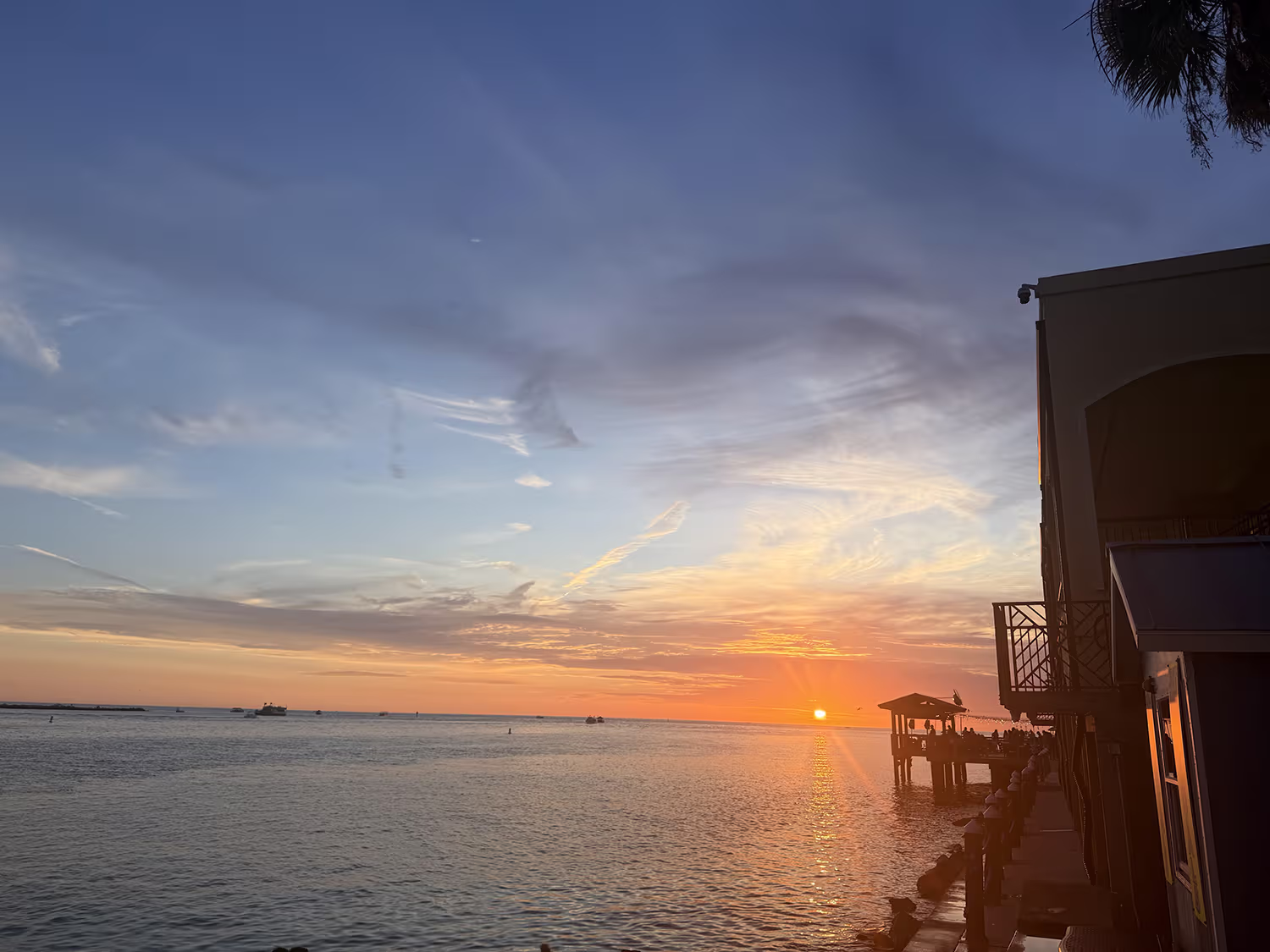 Orange sunset over the Gulf of Mexico in Clearwater Beach, Florida