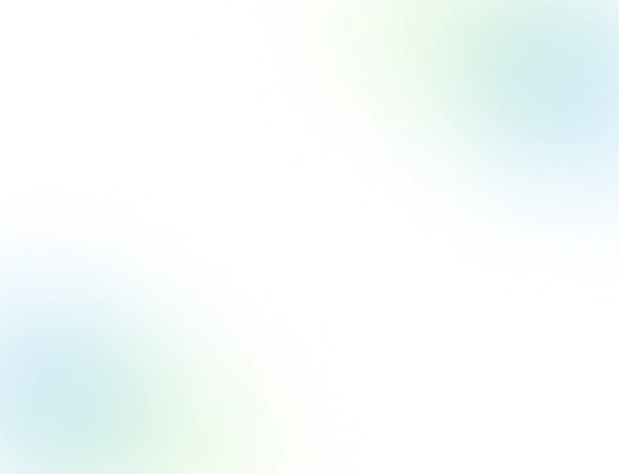 Close-up of a woman's blue eye with well-groomed eyebrows and long eyelashes.