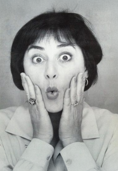 [background image] image of stage with seating for author & writer