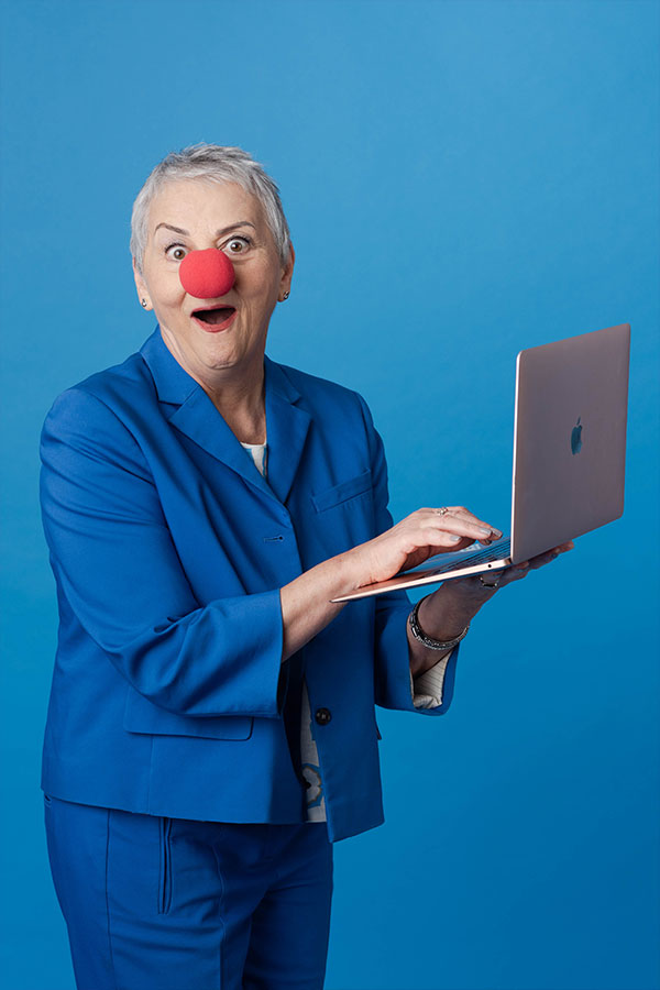 [background image] image of stage with seating for author & writer