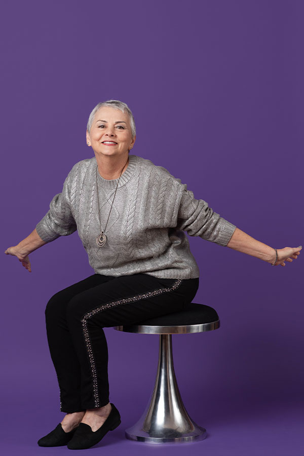 [background image] image of stage with seating for author & writer