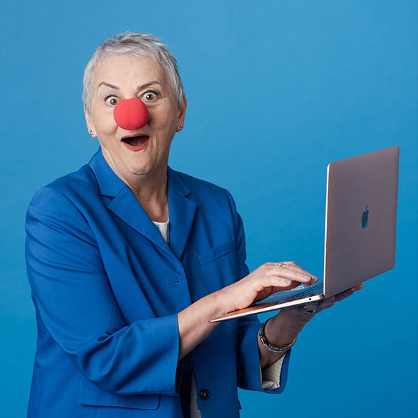 [background image] image of stage with seating for author & writer