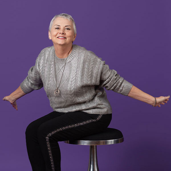 [background image] image of stage with seating for author & writer