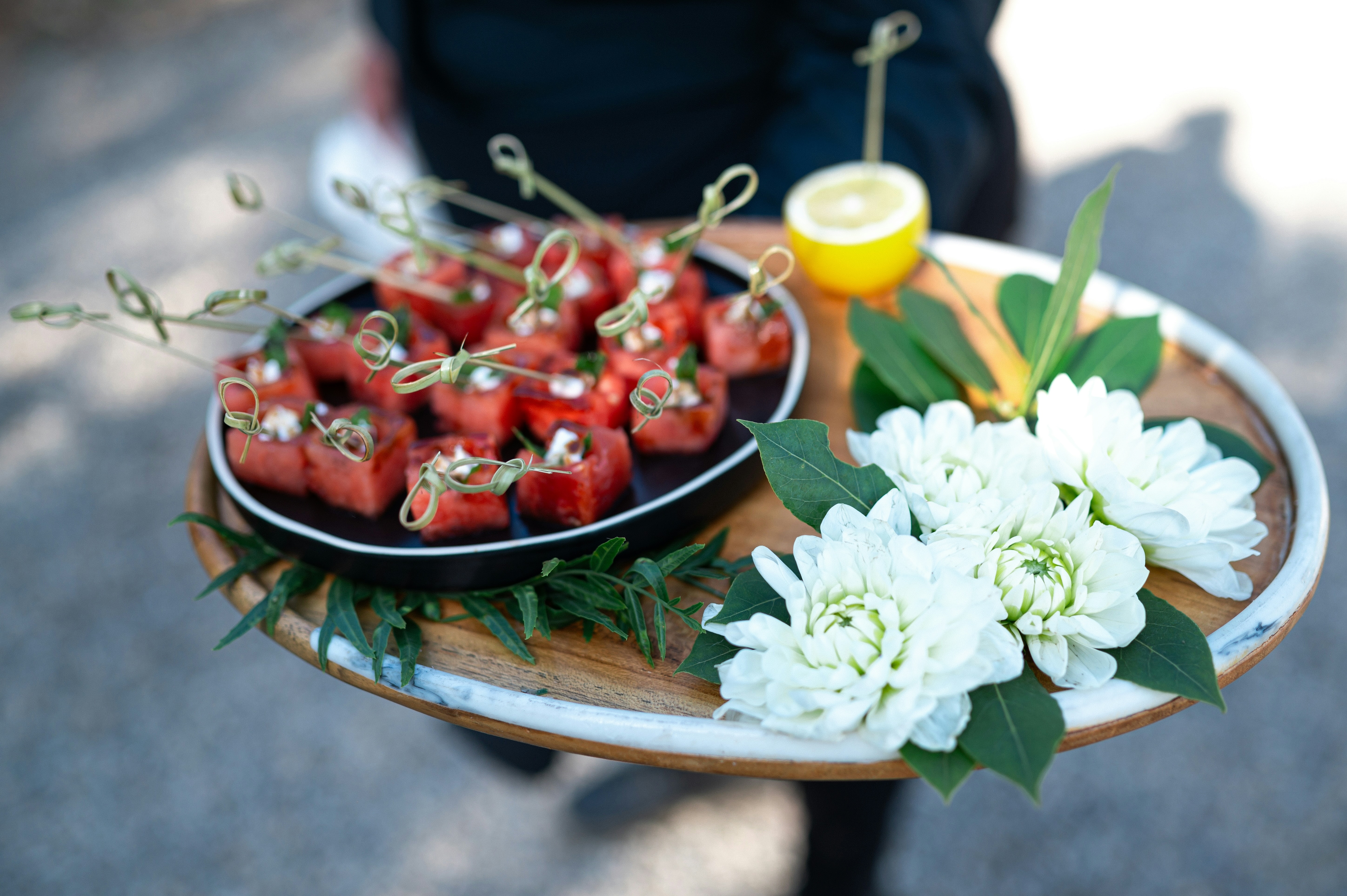Small tray passed bites at summer wedding