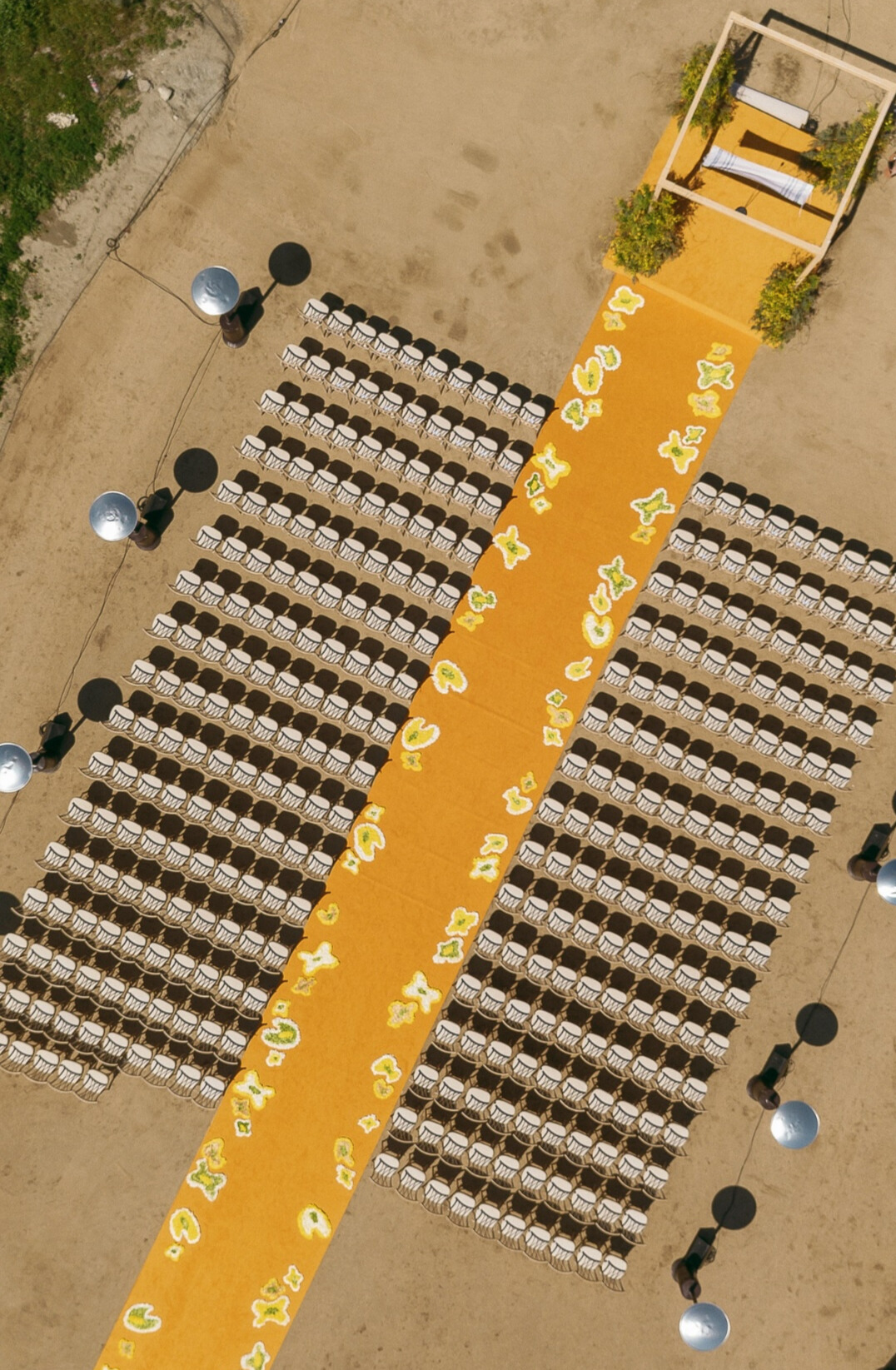 Boho chic wedding drone shot of aisle