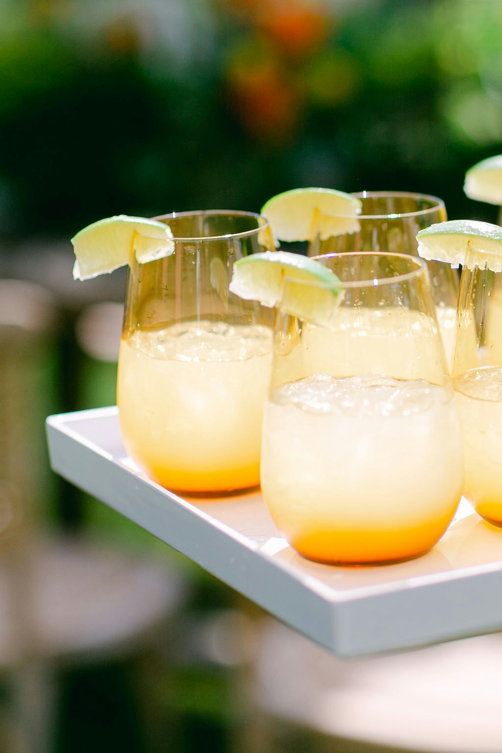 Tray passed cocktails at a forest themed baby shower