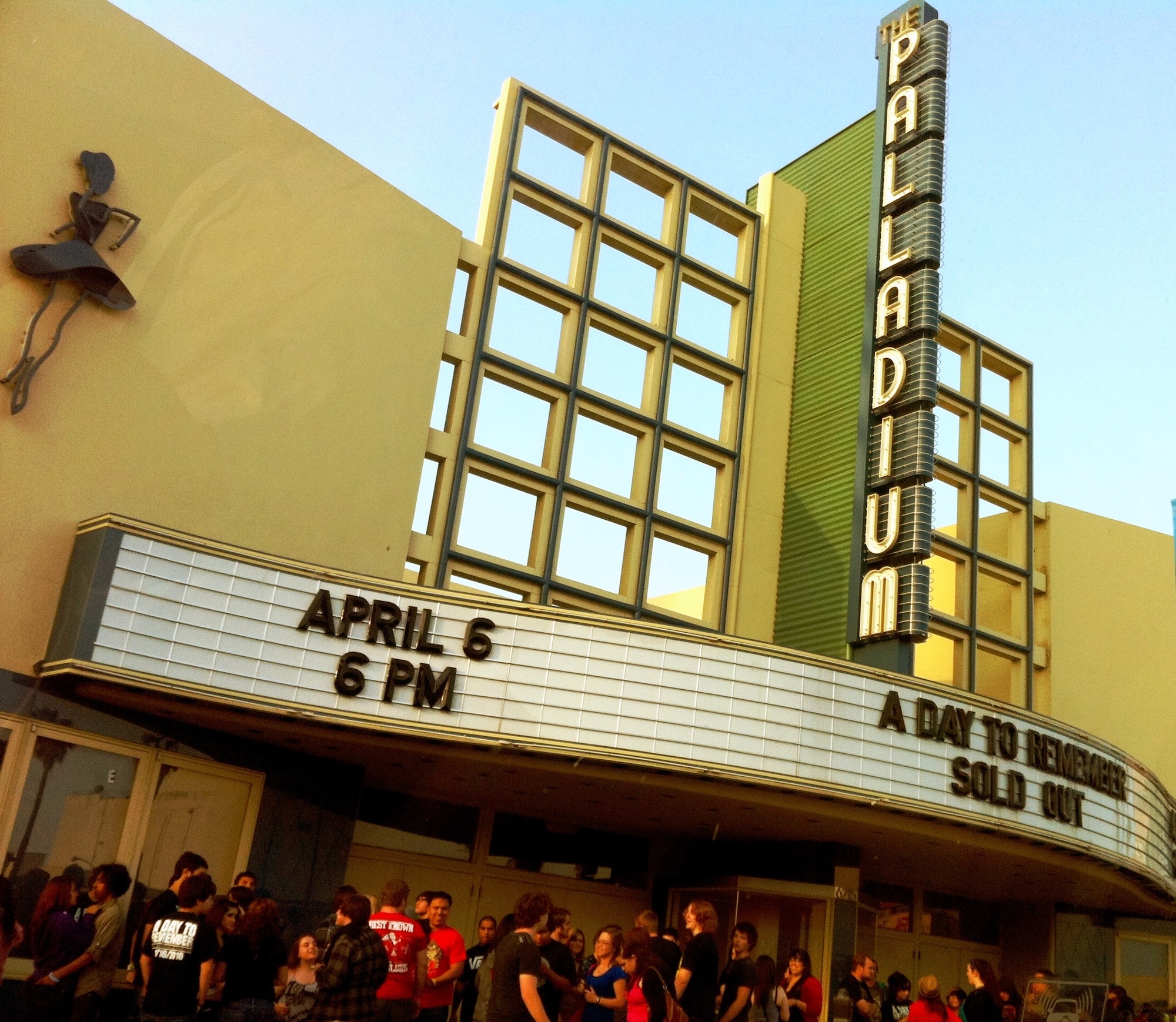 Crowd gathered outside The Palladium theater with marquee showing a sold-out A Day to Remember concert on April 6 at 6 PM.