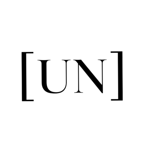 Stylized text '[UN]' in gray on black background.