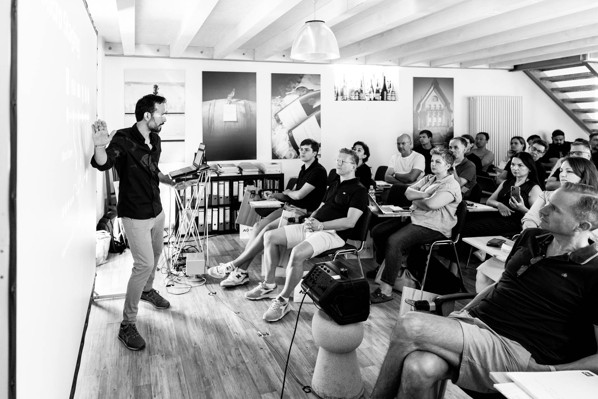 Dr.Mora Explains to group of people microstaging