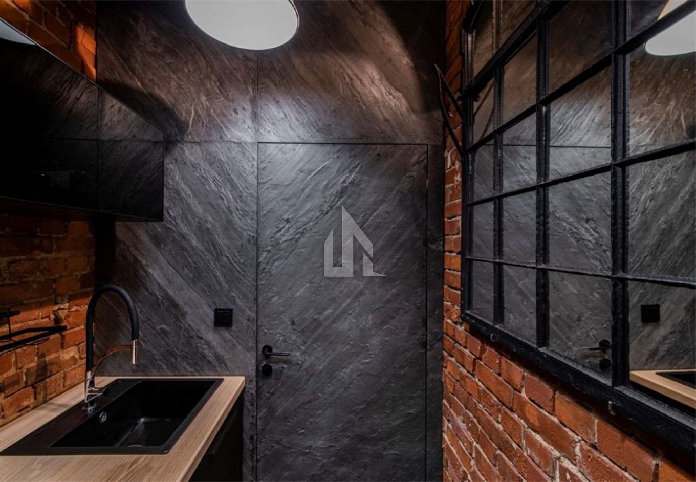 Black Pearl natural stone cladding - ocean-inspired depth and blue undertones