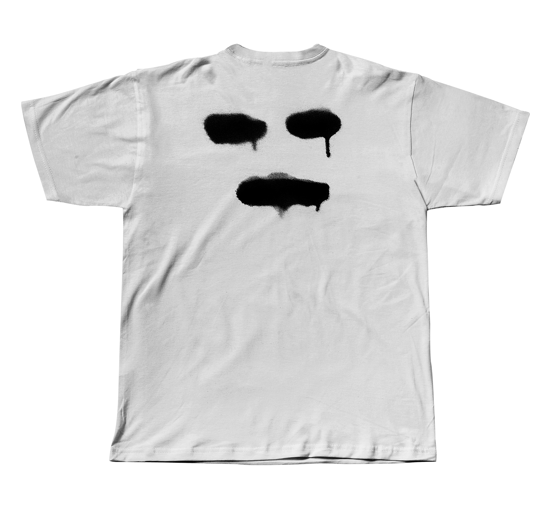 White t-shirt with a black spray-painted abstract face design on the back, featuring two eyes and a mouth with drips.