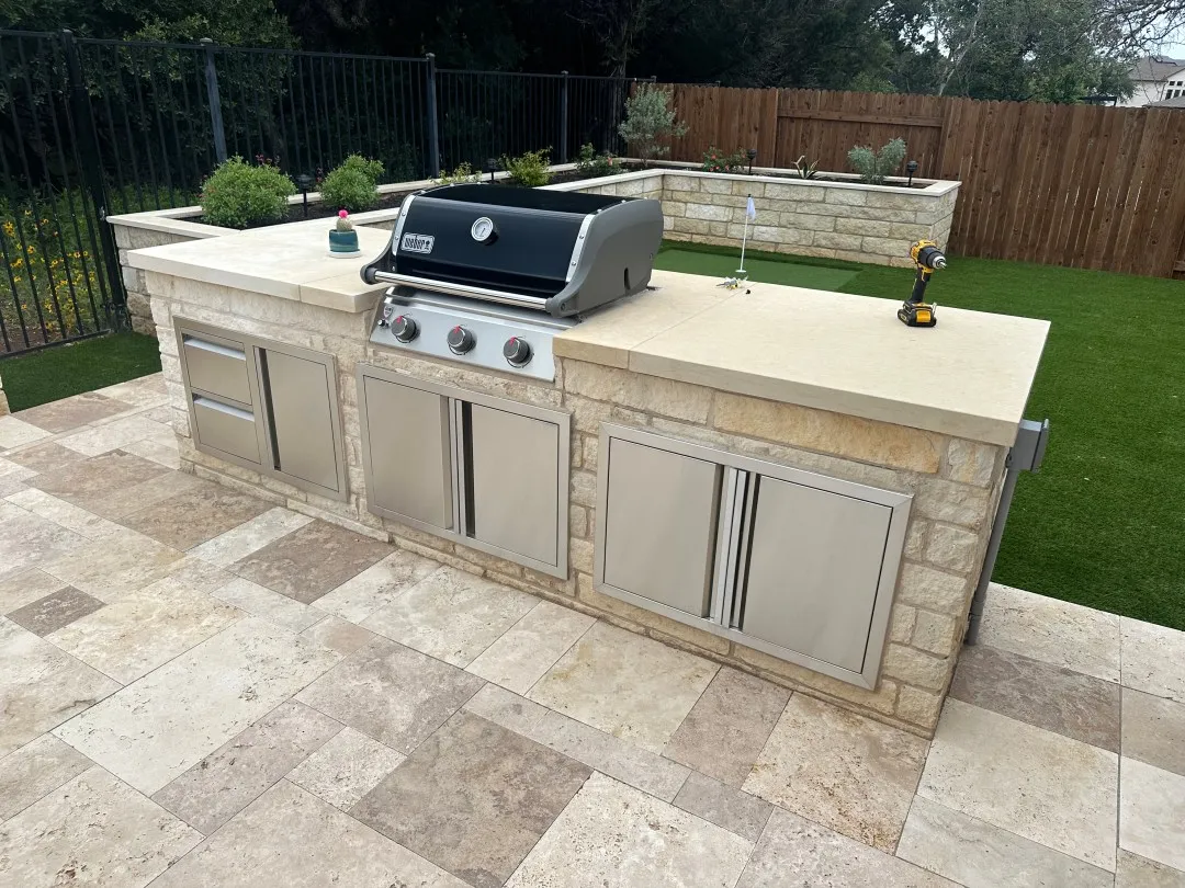 Custom stone outdoor kitchen installation