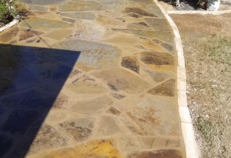 Flagstone patio crafted by ATX Prestige Landscaping