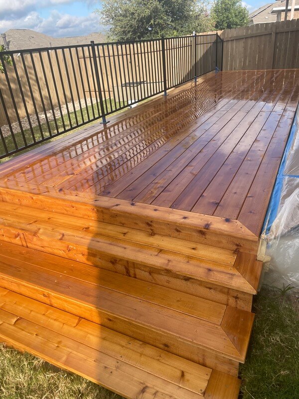 Cedar deck with warm wood boards and railing