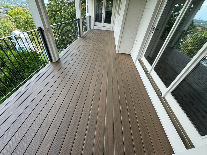 Composite deck beside a home