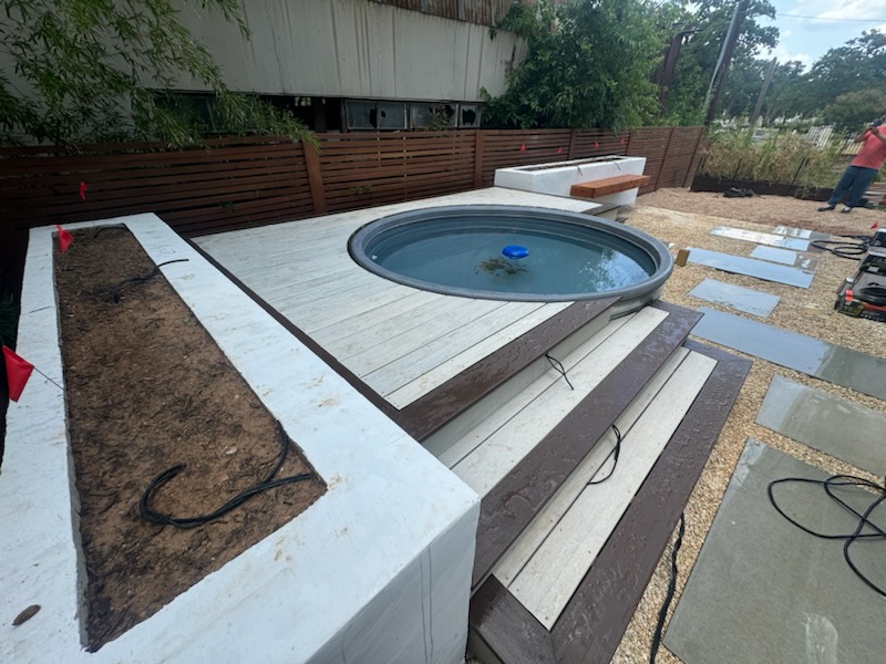 Timber tech deck around stock tank pool