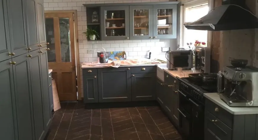 A finished kitchen respray in a dark, modern colour. 