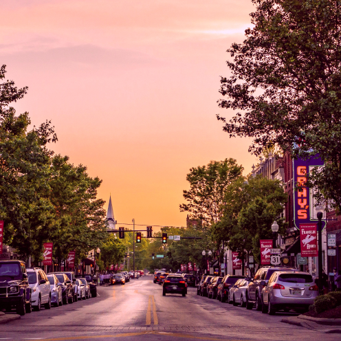 Morning sunrise over Main St. in a mid-to-small sized town in the USA.
