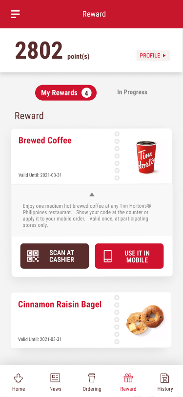 Mobile app screen showing 2802 reward points with 4 available rewards including brewed coffee and cinnamon raisin bagel from Tim Hortons.