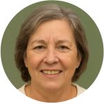 Smiling middle-aged woman with short gray hair against an olive green circular background.