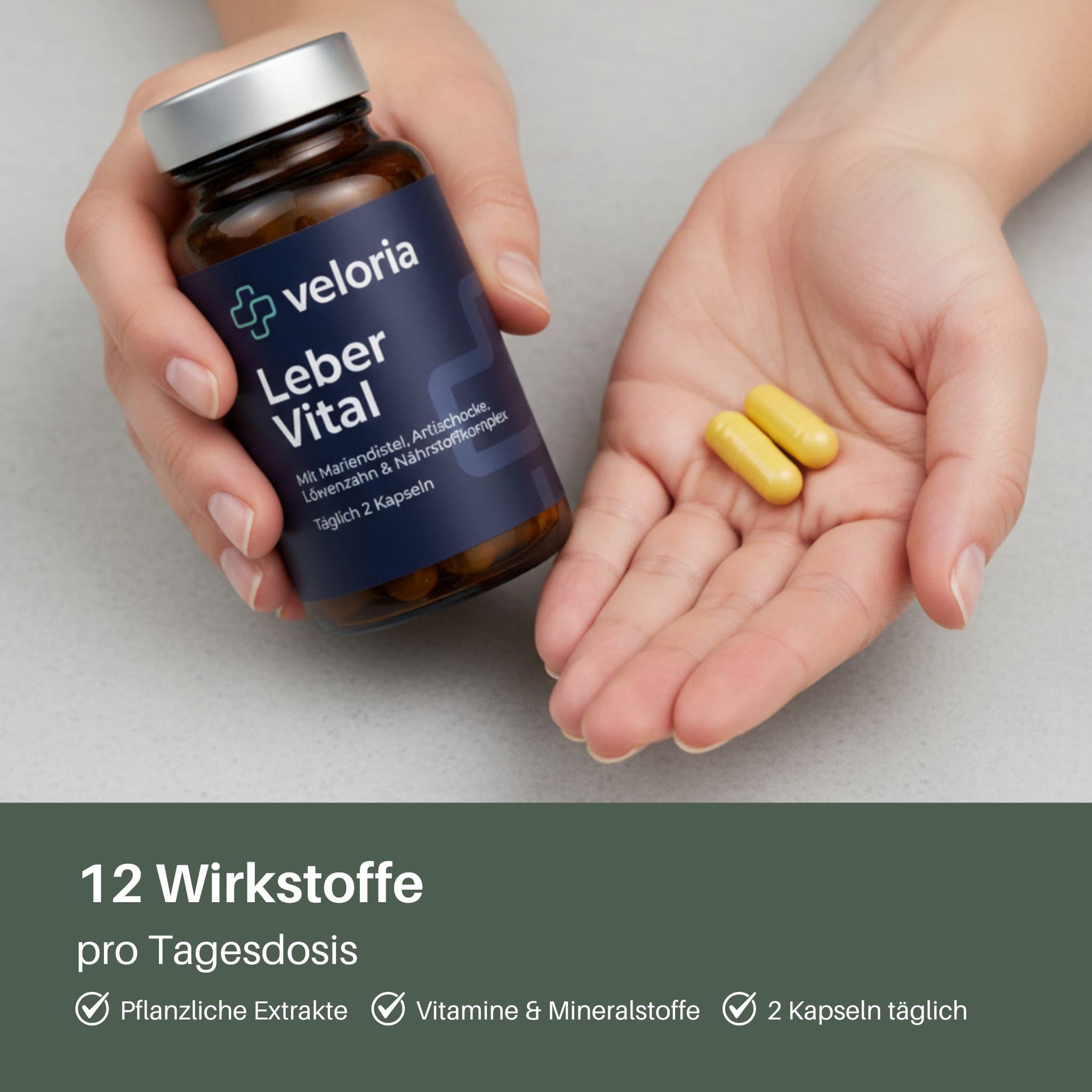Hand holding a brown bottle labeled Veloria Leber Vital with two yellow capsules in the other hand, promoting 12 active ingredients per daily dose including plant extracts, vitamins, and minerals.