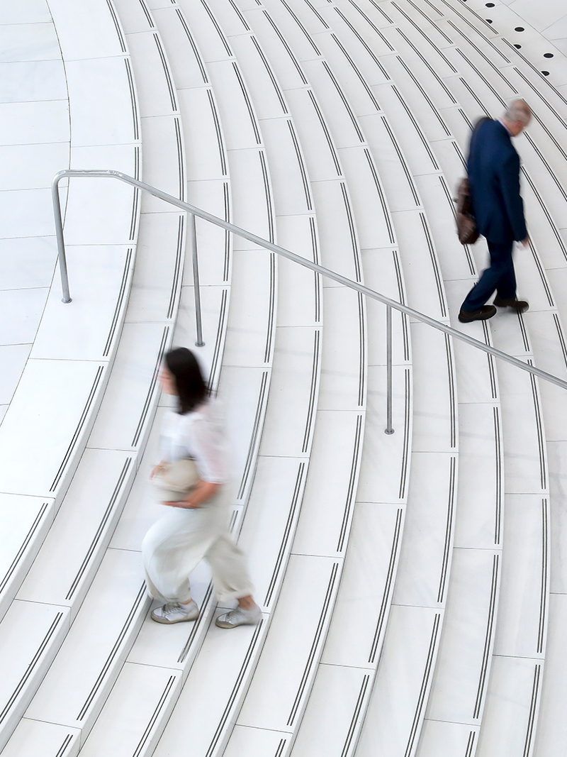 People walking on stairs.
