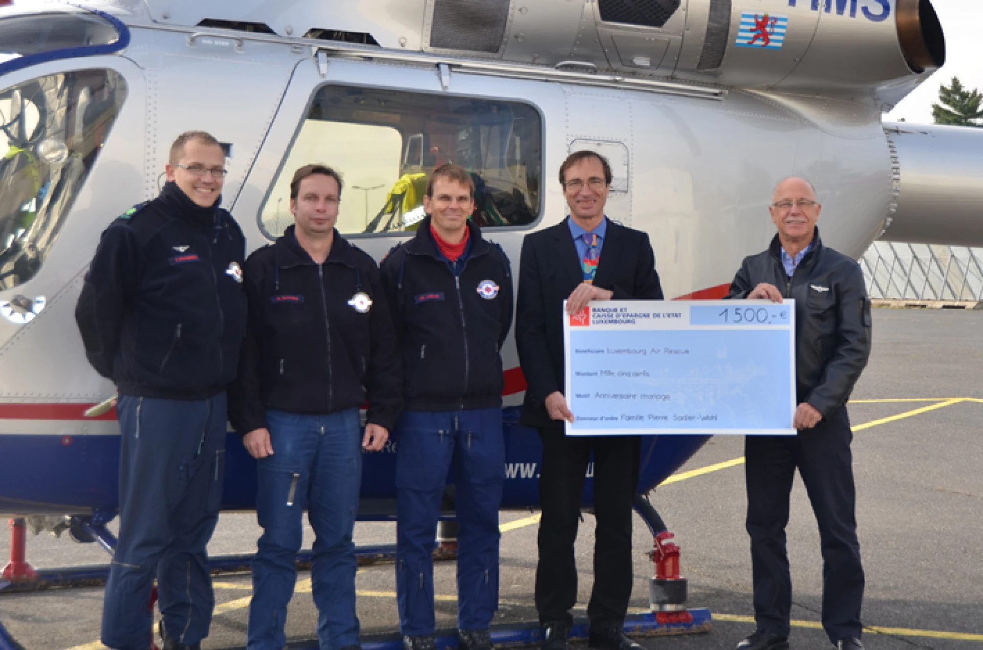Donation presentation to Luxembourg Air Rescue during a visit at Findel Airport.