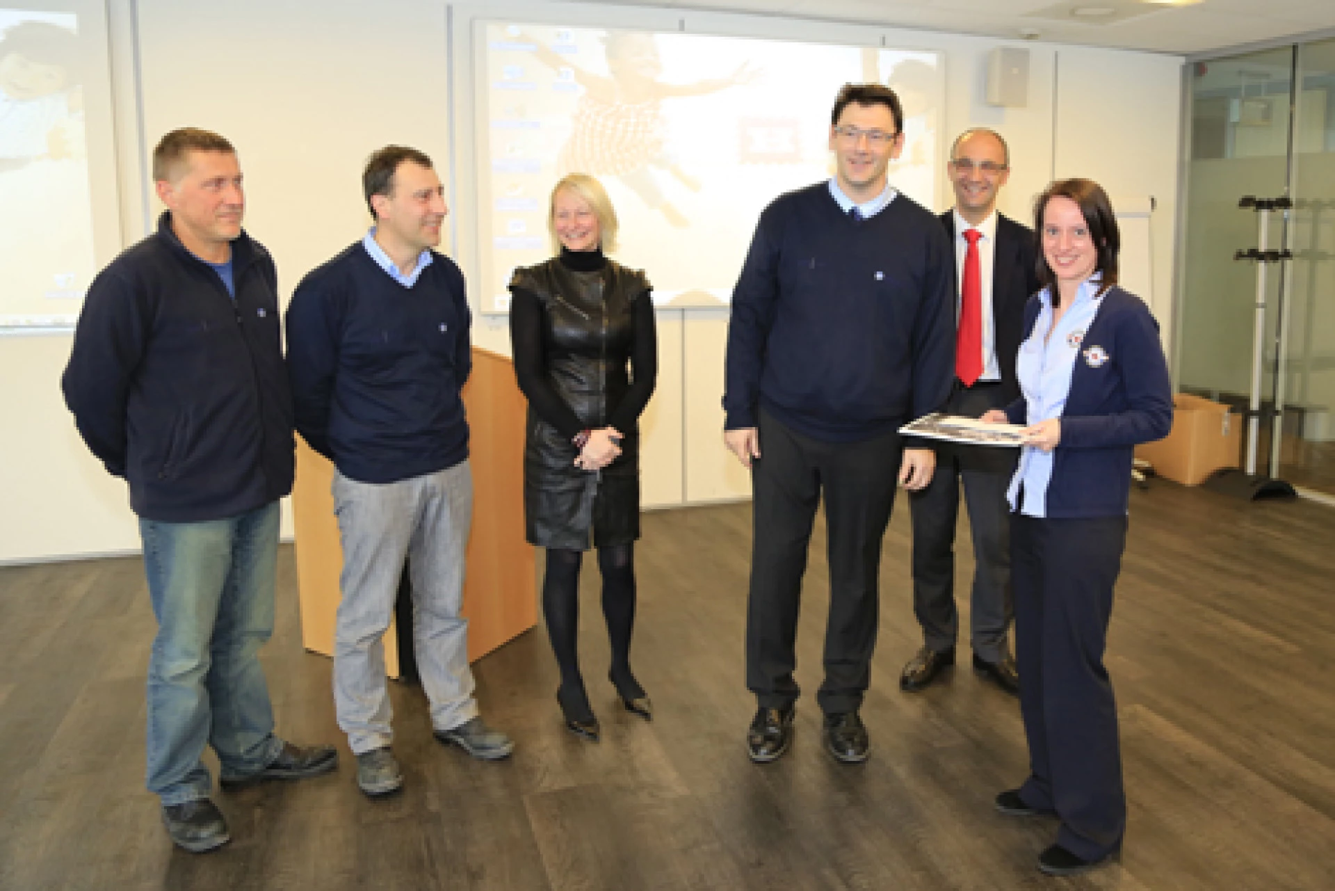 Representatives of Belgian and Luxembourg charities presenting donations including support for Luxembourg Air Rescue.