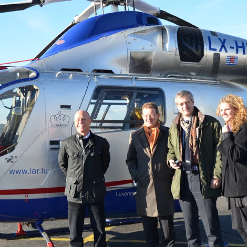 Dutch and Belgian ambassadors visiting Luxembourg Air Rescue with René Closter during a tour of the Findel air rescue base.