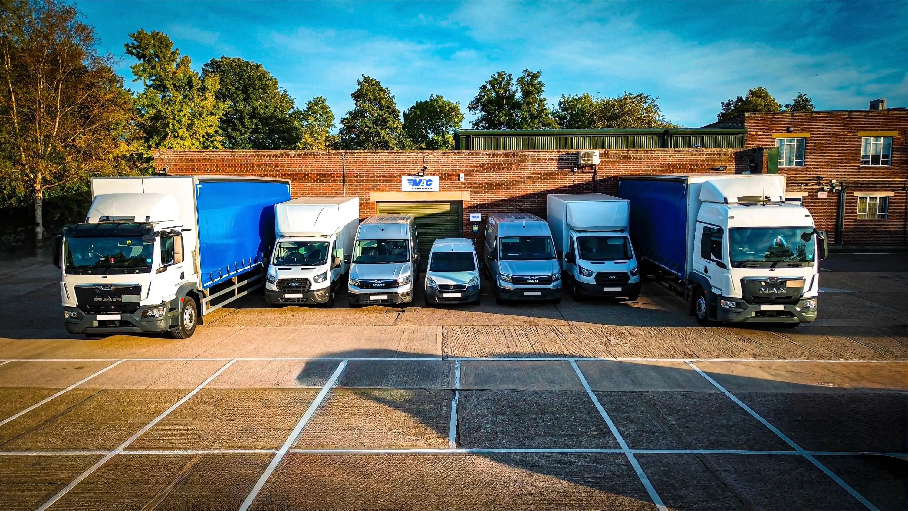 MAC Courier Service delivery vehicle lineup.
