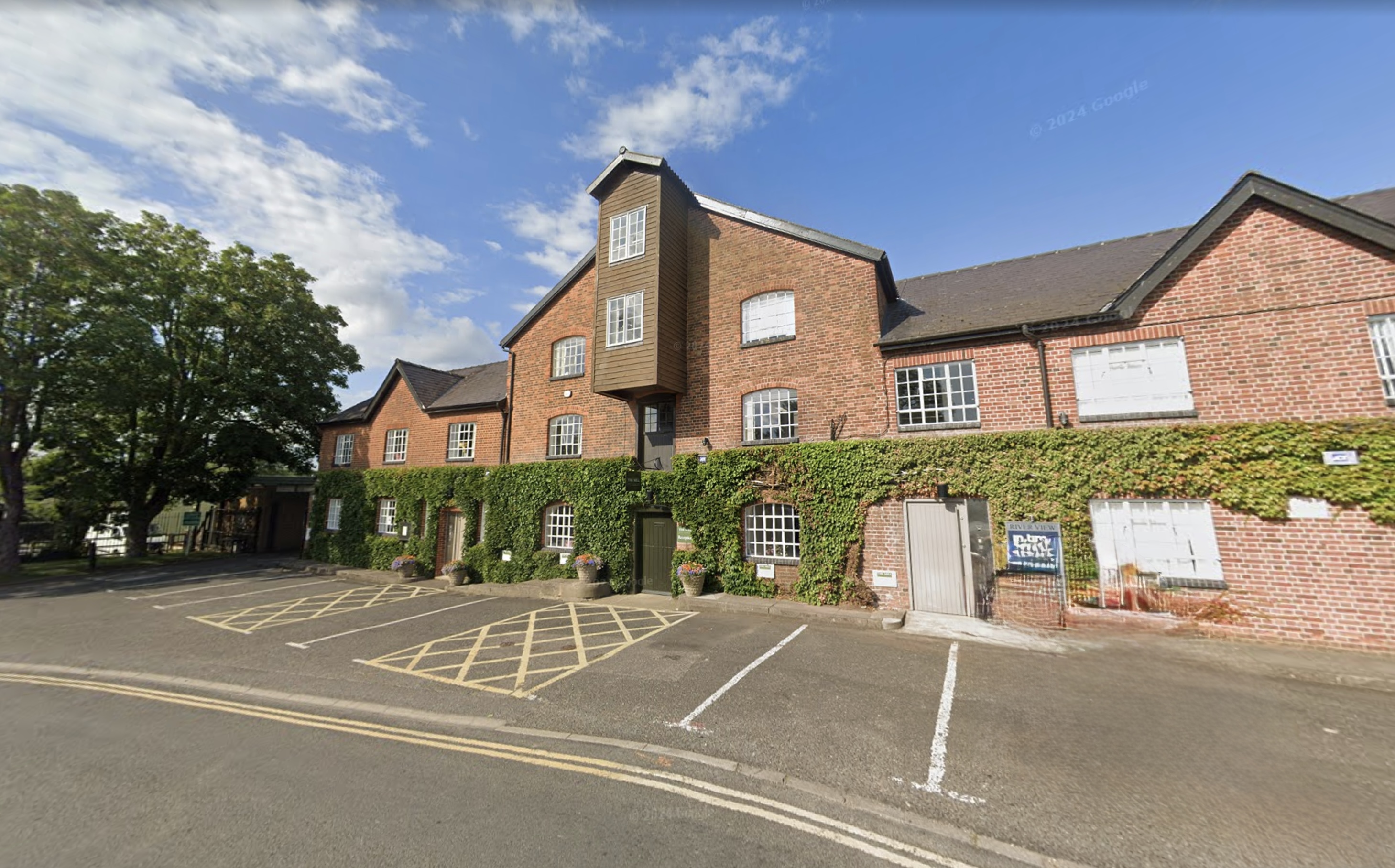 "The Mill" front of office building