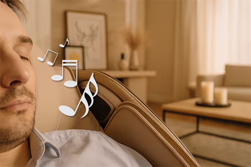 Enceintes Bluetooth intégrées du fauteuil de massage MASSEA Supra France diffusant une musique relaxante pendant la séance