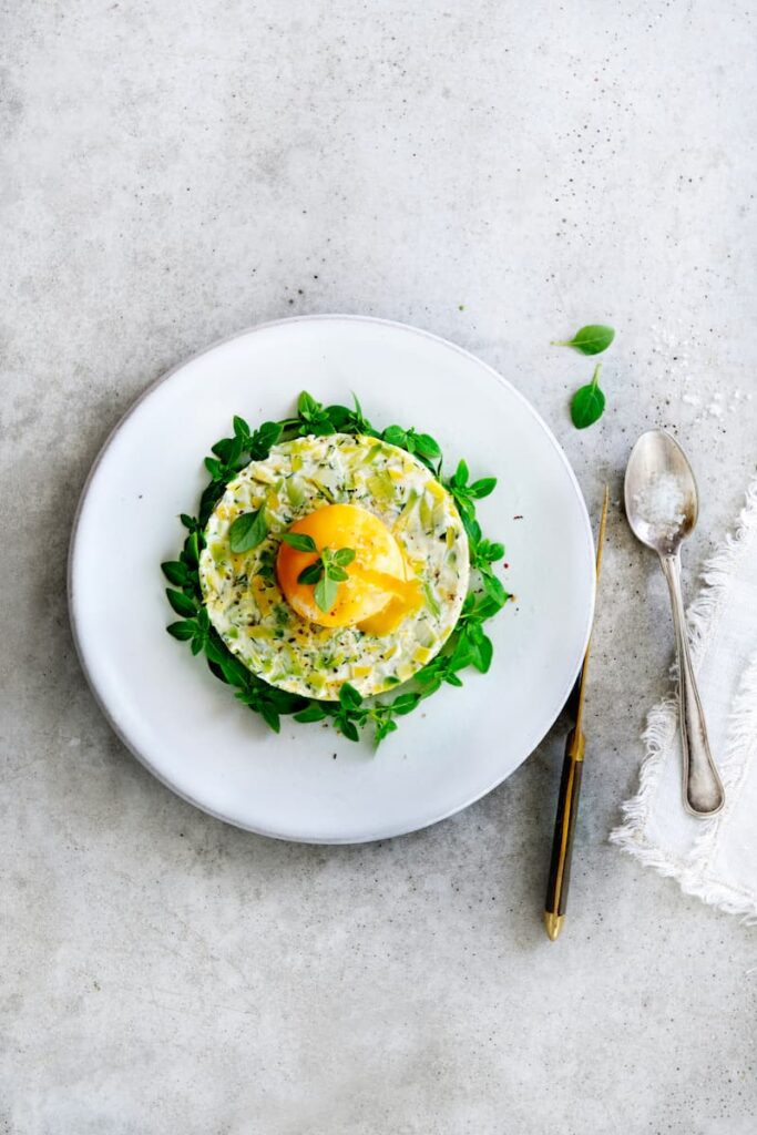 Avocado Tartare with Dill Cream and a Poached Egg Yolk
