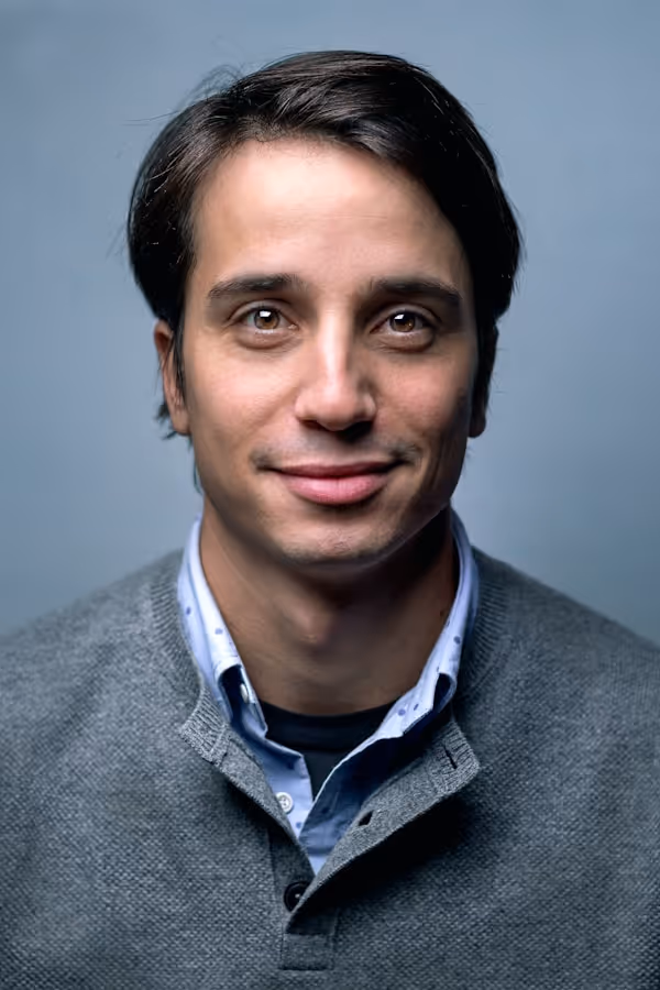a man smiling for a picture