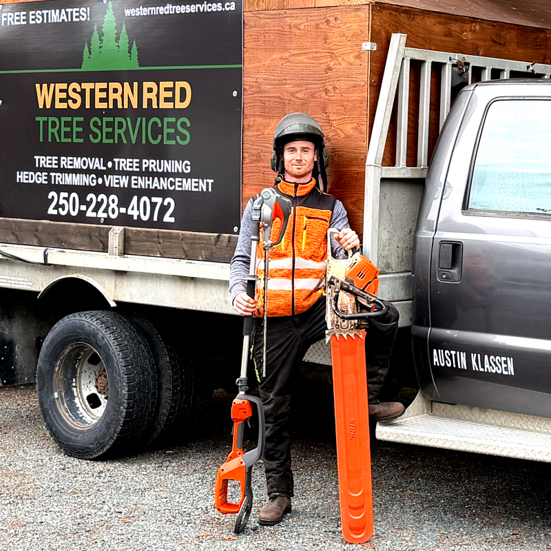 Austin Klassen infront of truck.