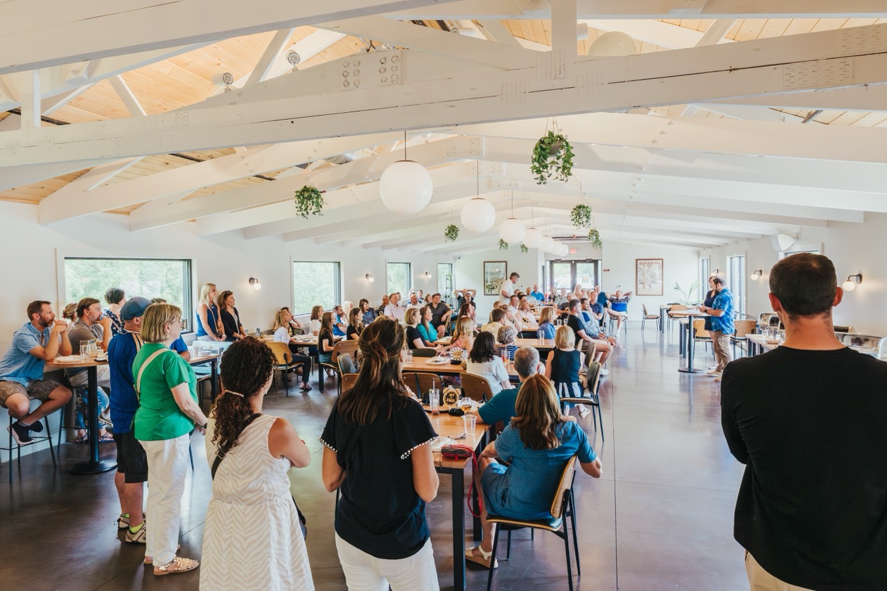 Guests celebrating a birthday party in the beer garden at DeWolf Brewing in Victor, NY