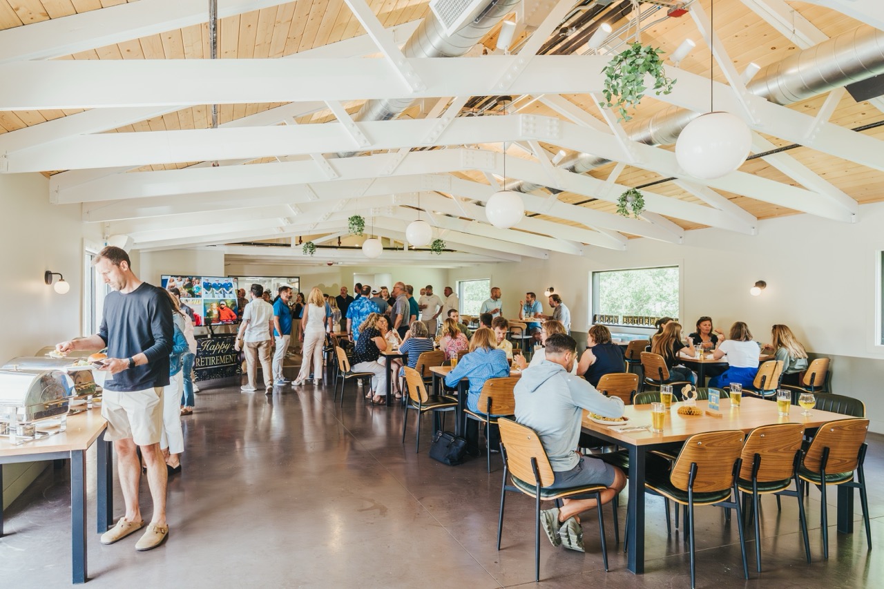 Guests gathered for a retirement party in the beer garden at DeWolf Brewing in Victor, NY