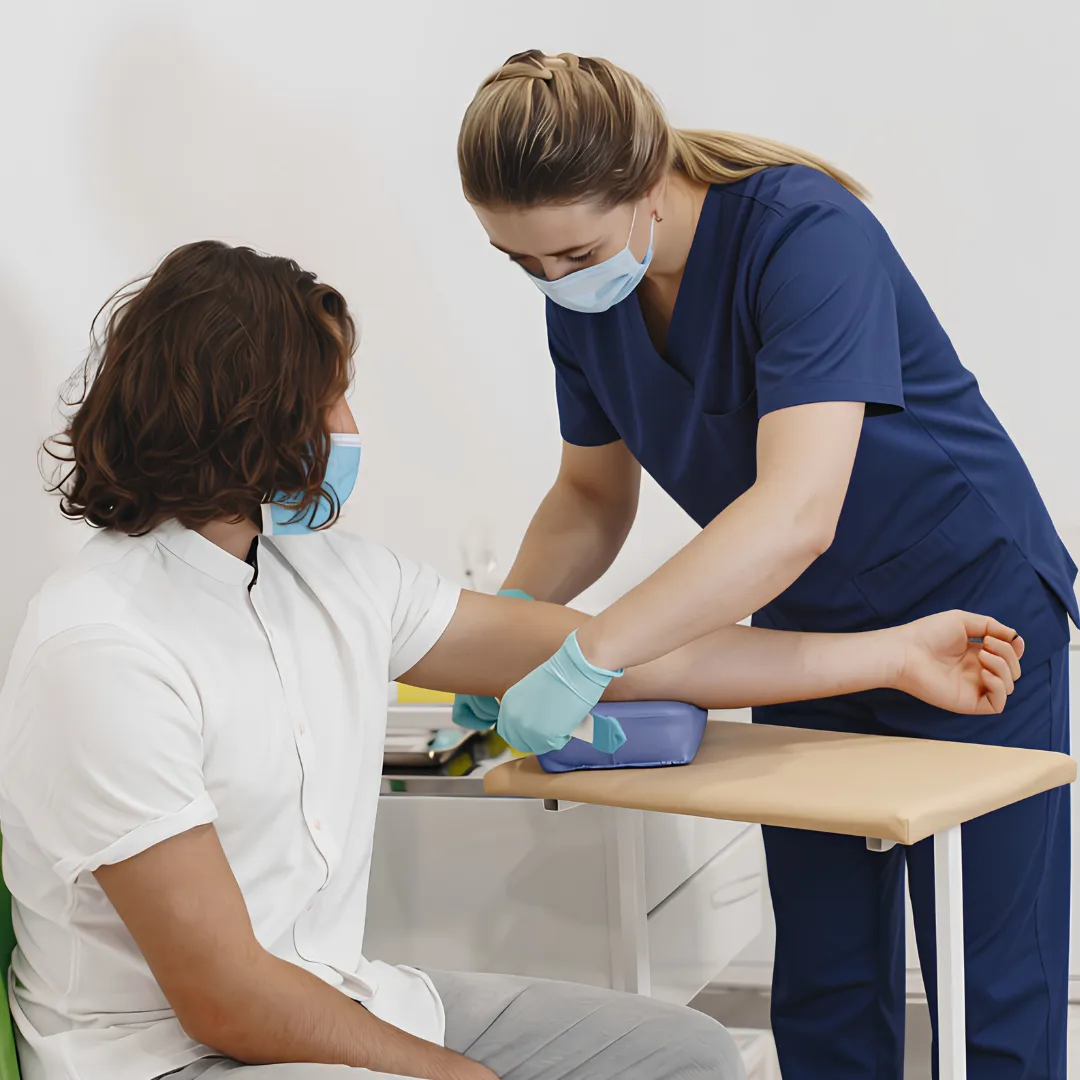 Nurse taking a blood sample from a patient as part of a health check
