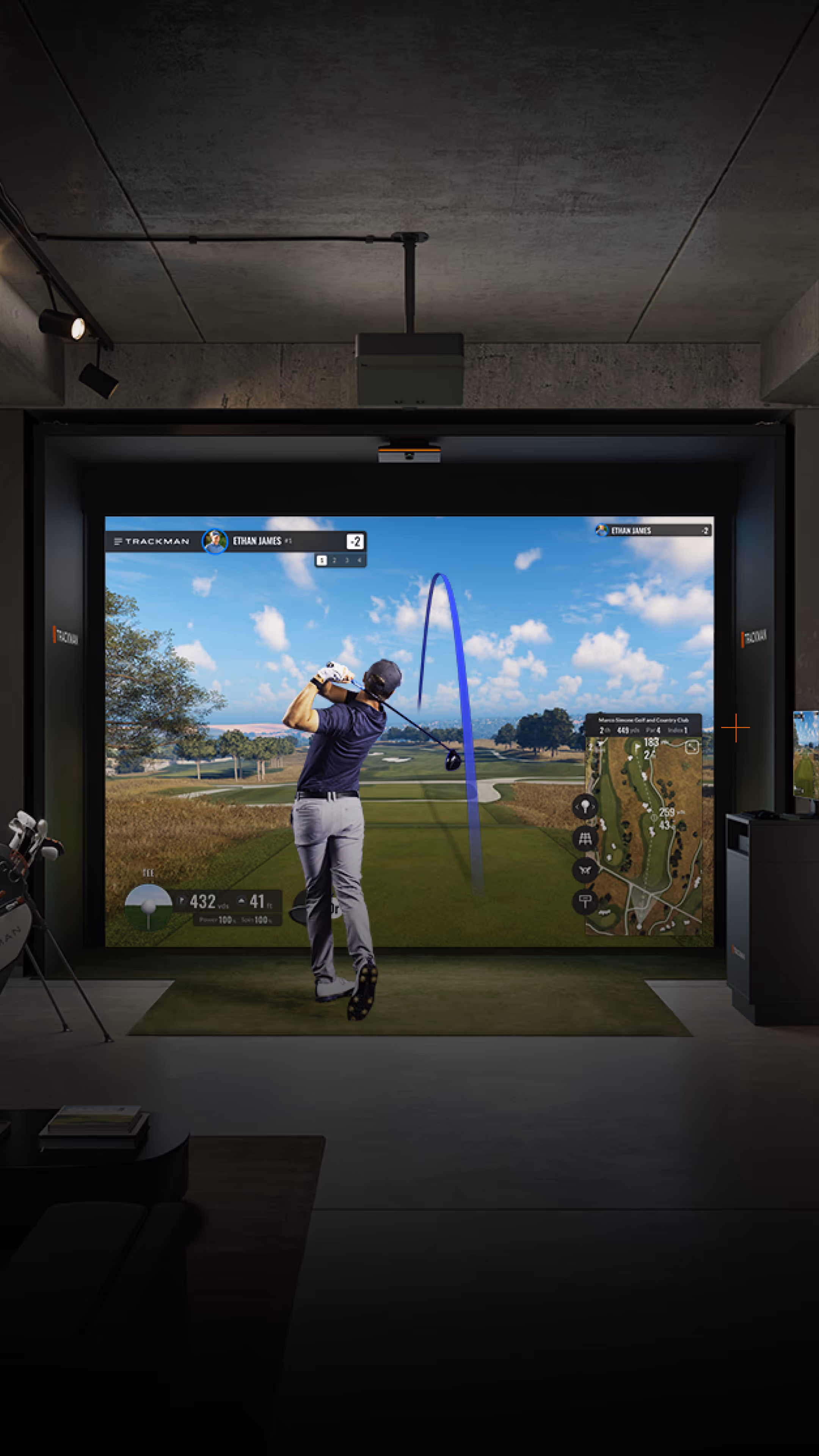 Trackman simulator of a golfer swinging his club and hitting the ball.