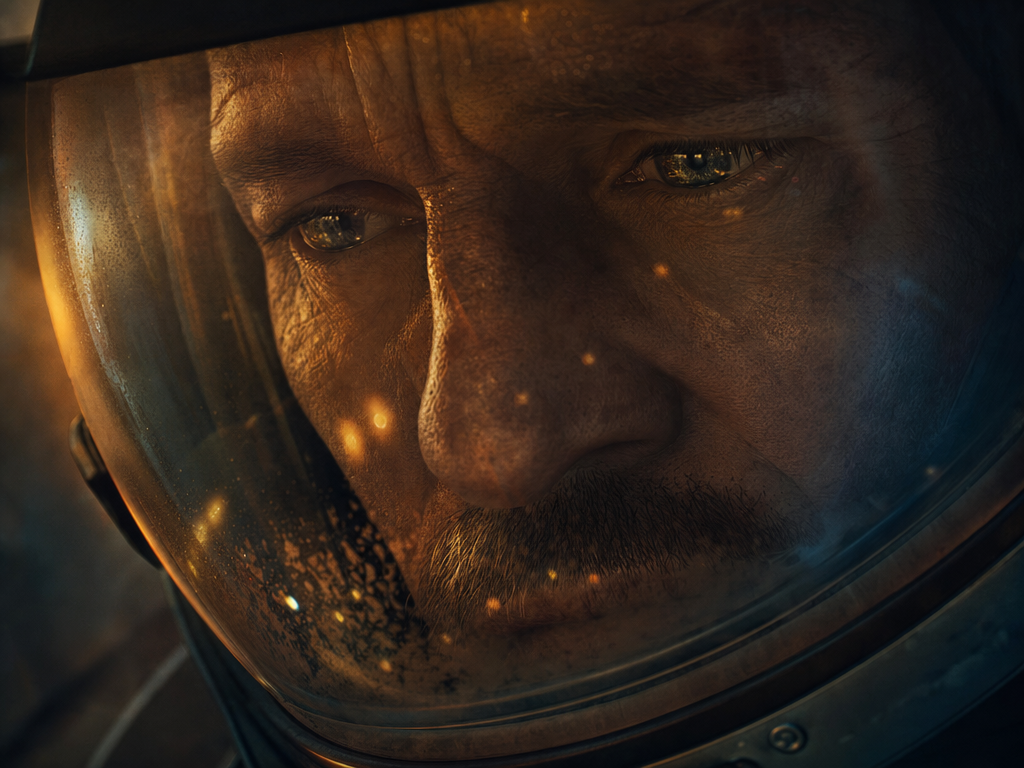 Close-up of a pilot's face lit by amber cockpit glow reflected in a helmet visor