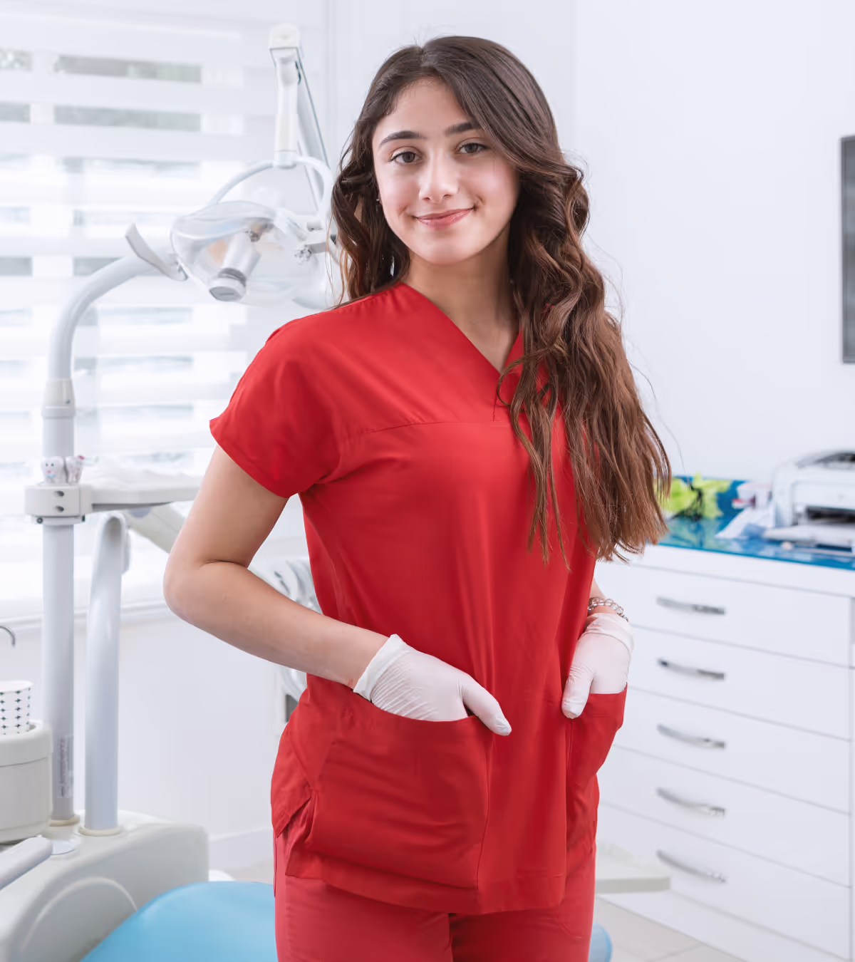 Woman dentist in red.