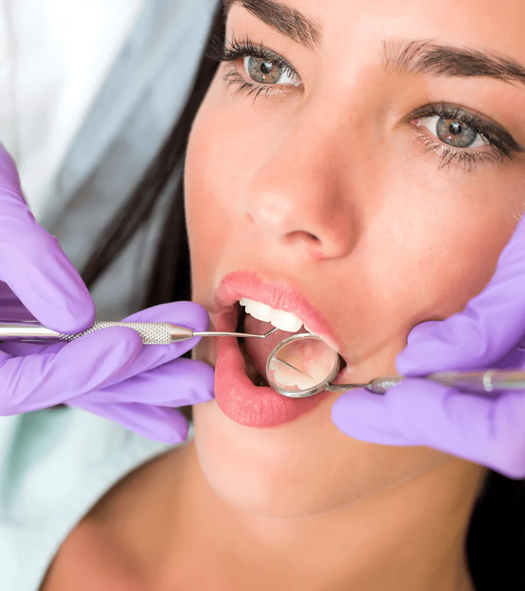 Woman getting dental work procedure.