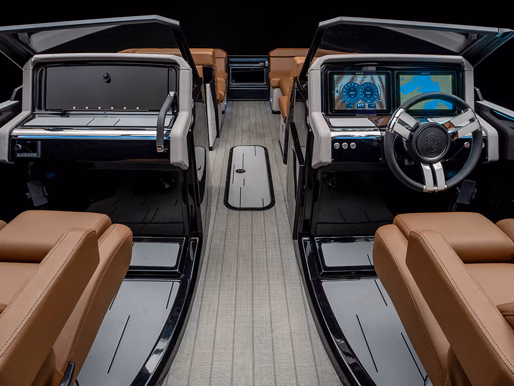 Luxury boat interior with dual captain’s chairs and digital navigation displays, marine lifestyle photography by Roe Photo.