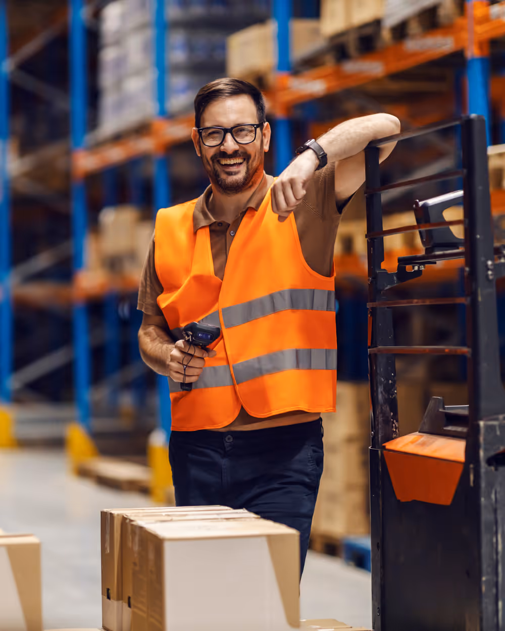 coffee shop owner is smiling and is handing over the coffee